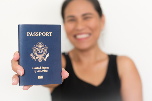 Discover how one woman's strength transformed her 11-year struggle into a triumphant journey to US citizenship. Read her inspiring story!